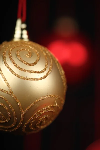 Golden Christmass bauble — Stock Photo, Image