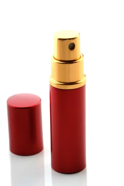 Parfym i röda behållare — Stockfoto