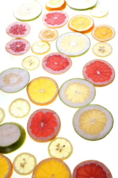 Sliced lemons and grapefruits — Stock Photo, Image