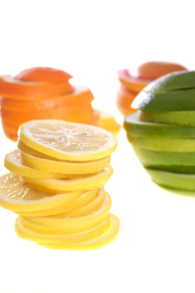 Sliced lemon and grapefruits — Stock Photo, Image