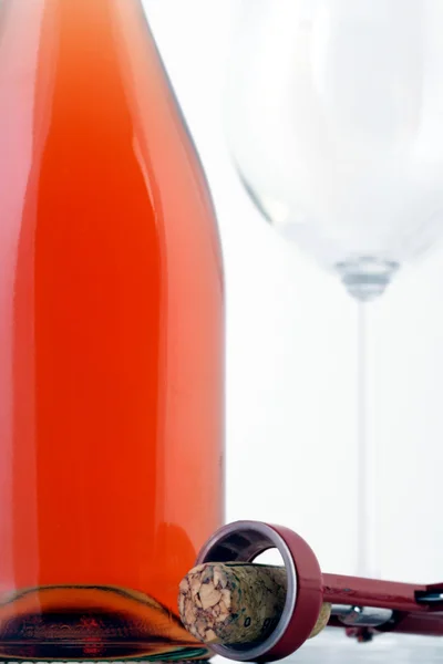 Láhev růžové víno — Stock fotografie