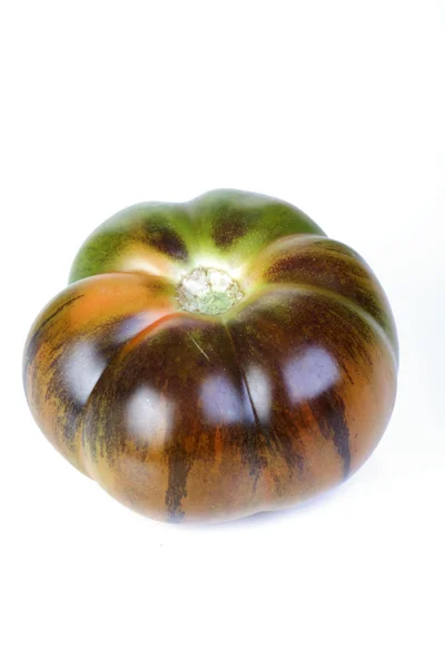 One black tomato — Stock Photo, Image