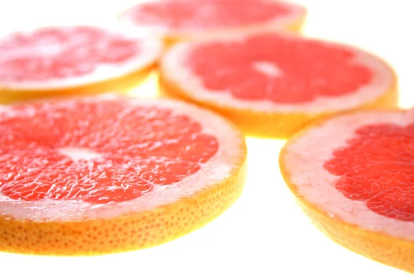 Saftiga skivade grapefrukter — Stockfoto