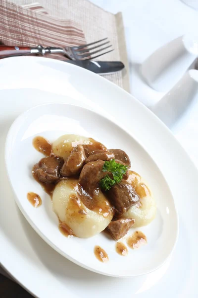 Silesian dumplings on white plate — Stock fotografie