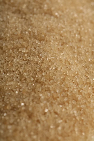 Bruine suiker achtergrond — Stockfoto
