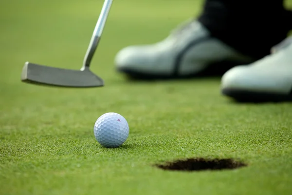 Person som spelar golf — Stockfoto