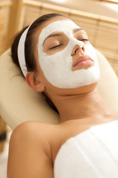 Woman wearing facial mask — Stock Photo, Image