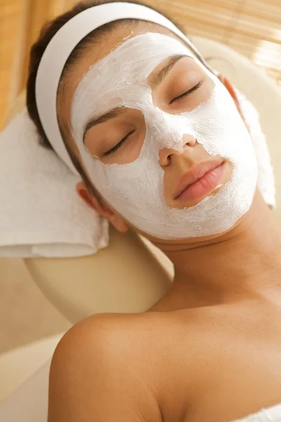 Woman wearing facial mask — Stock Photo, Image