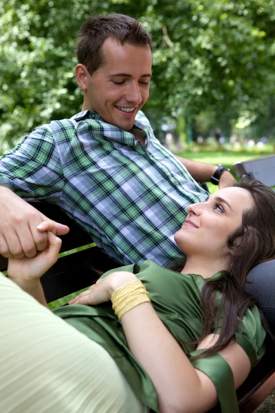 Girlfriend resting head on lap — Stock Photo, Image