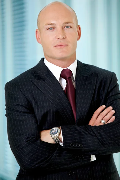 Businessman standing  in office — Stock Photo, Image