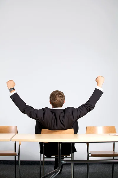 Businessman sitting in office — Stock Photo, Image