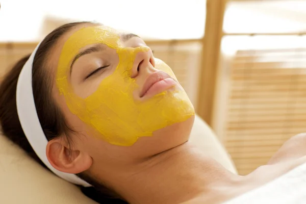 Woman wearing facial mask — Stock Photo, Image