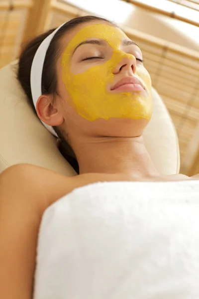 Woman wearing facial mask — Stock Photo, Image