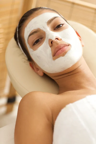 Woman wearing facial mask — Stock Photo, Image