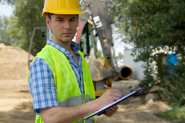 Architect using clipboard — Stock Photo, Image