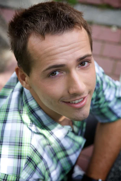 Young man smiling — Stock Photo, Image