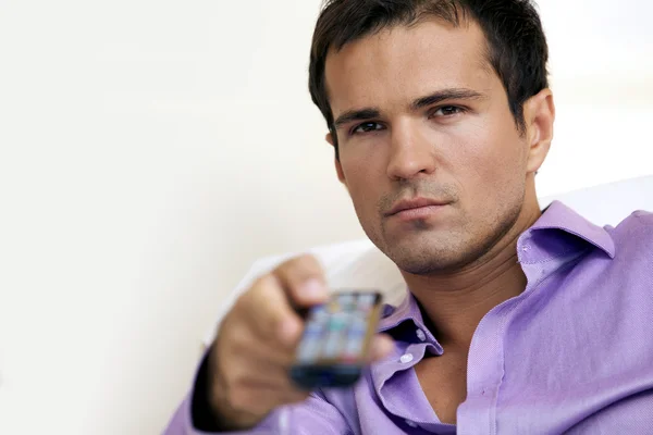 Man using remote control — Stock Photo, Image