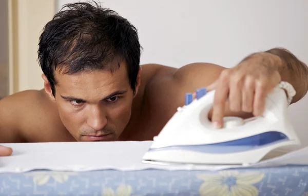 Man ironing clothes — Stock Photo, Image