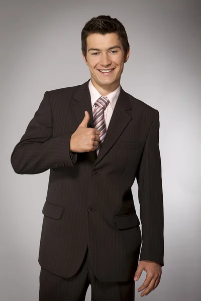 Businessman showing ok gesture — Stock Photo, Image