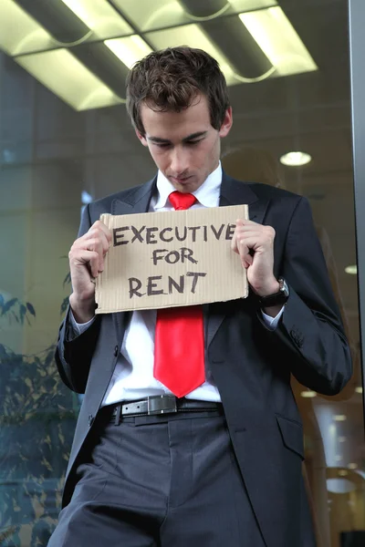 businessman with executive for rent note