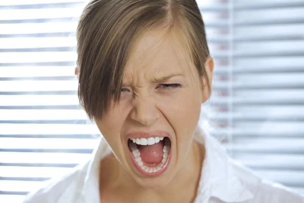 Young businesswoman shouting — Stock Photo, Image