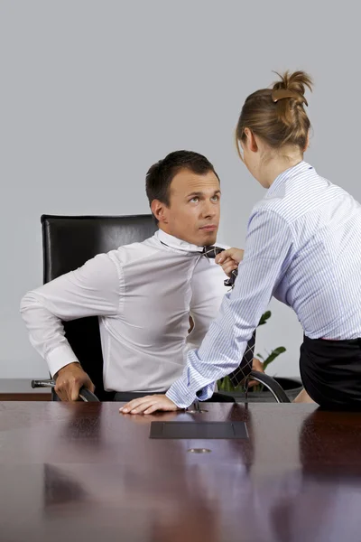 Businesswoman flirting with businessman — Stock Photo, Image