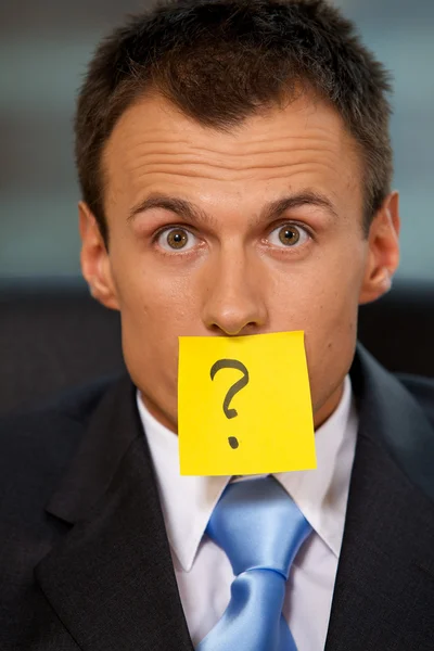 Businessman with  note stuck to his mouth — Stock Photo, Image