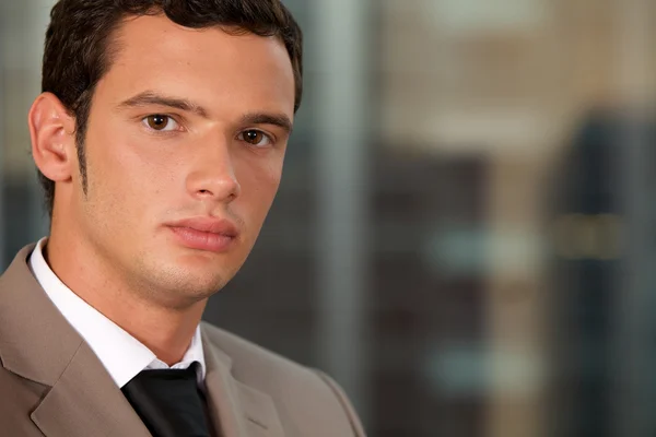 Businessman standing in office — Stock Photo, Image