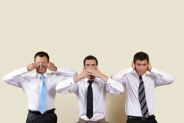 Businessman covering eyes, mouth and ears — Stock Photo, Image