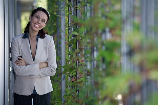 Businesswoman with arms crossed — Stock Photo, Image