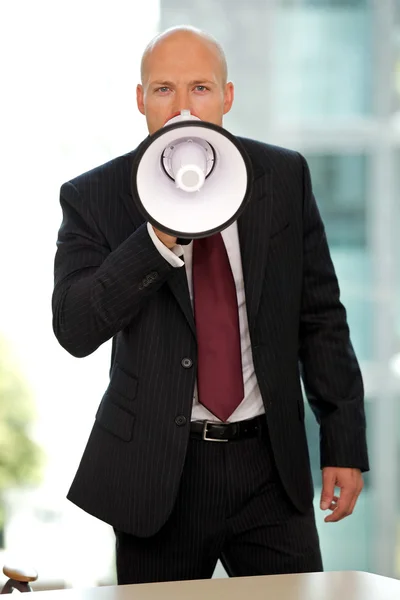 Businessman screaming at camera — Stock Photo, Image