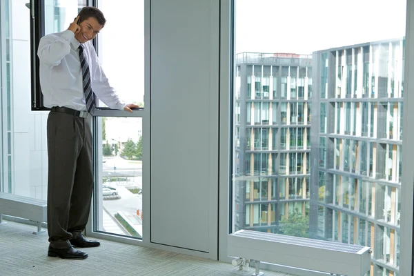 Businessman using phone — Stock Photo, Image