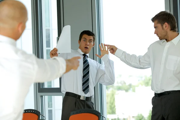Businessmen blaming his colleague — Stock Photo, Image