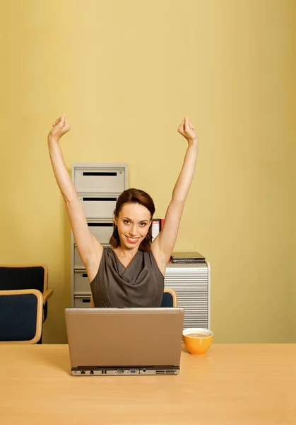 Businesswoman with arms raised — Stock Photo, Image