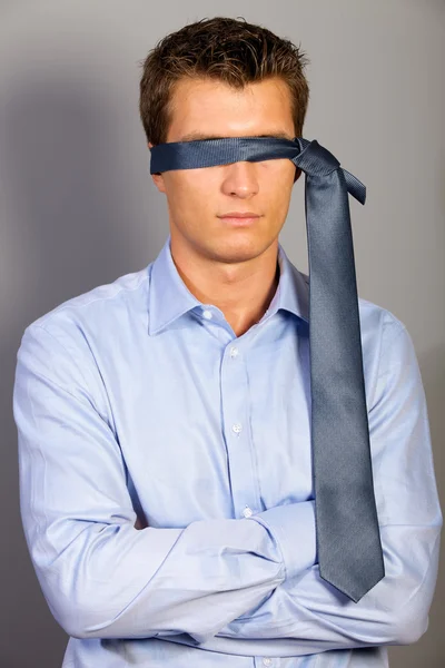 Businessman blindfolded with tie — Stock Photo, Image