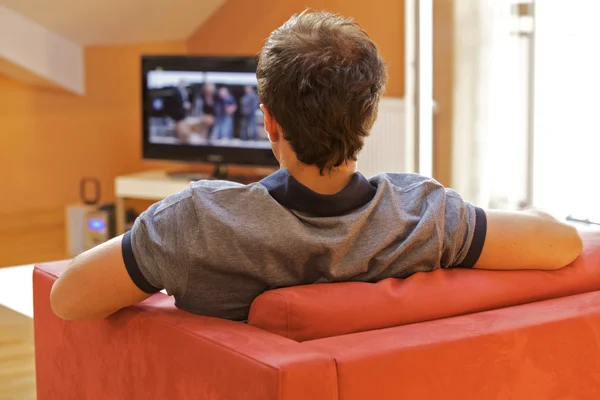 Man watching television Royalty Free Stock Images