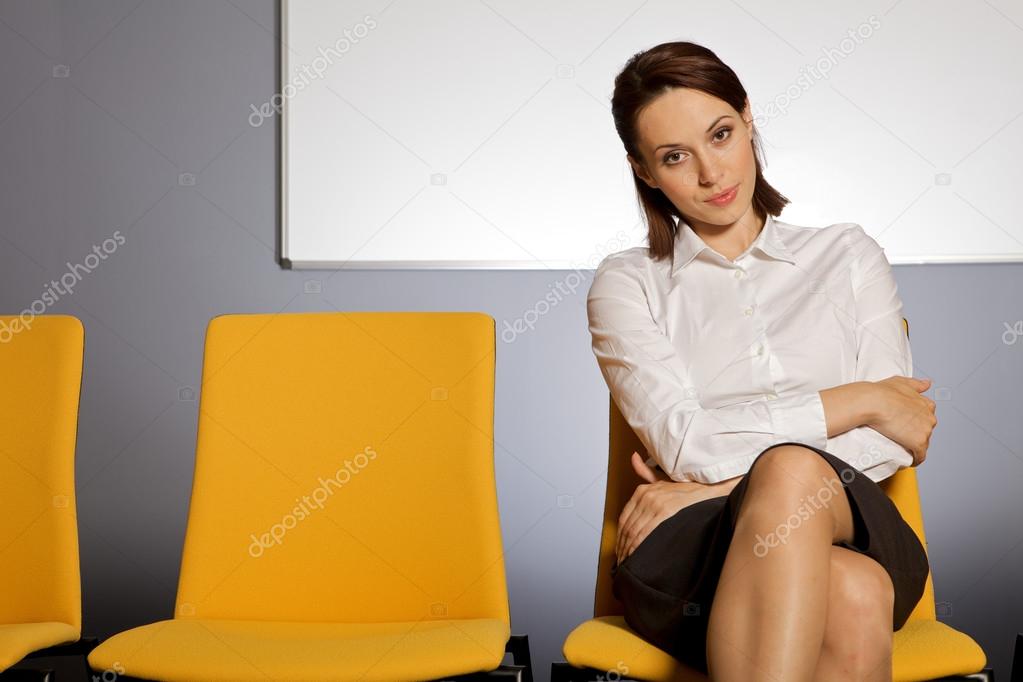 Businesswoman sitting in waiting room