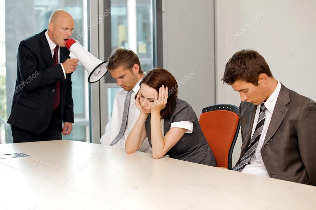 businessman screaming on his employee