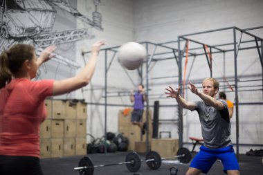 Man throwing medicine ball