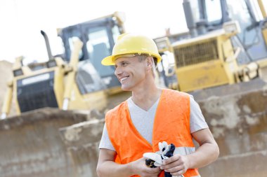 Happy supervisor looking away