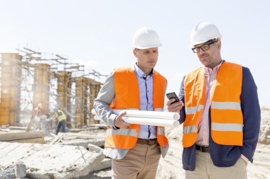 engineers using mobile phone