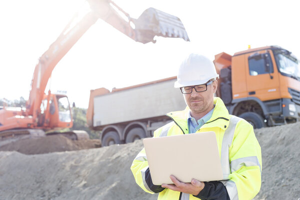 Supervisor using laptop