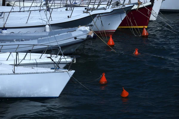 Multiple boats tied to buoys — Φωτογραφία Αρχείου