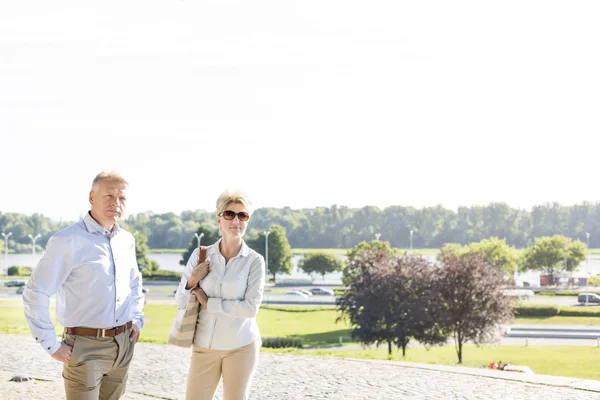 Couple standing at park — Stock Photo, Image