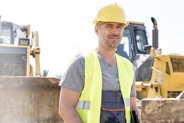 Supervisor standing at construction site — Stok fotoğraf