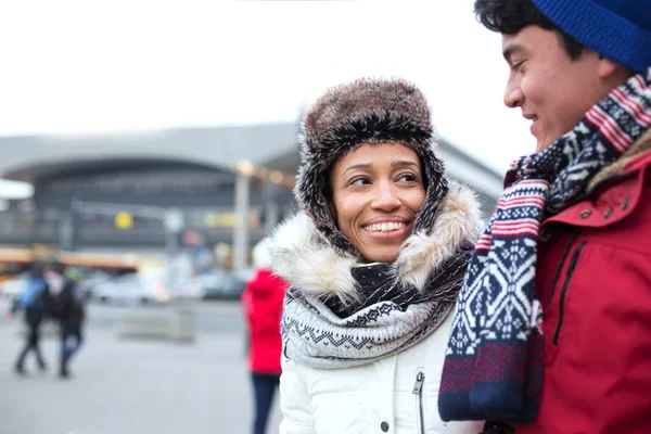 Couple talking while walking in city — Stock Photo, Image