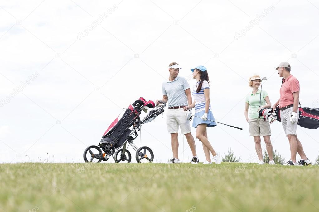 Friends communicating while walking