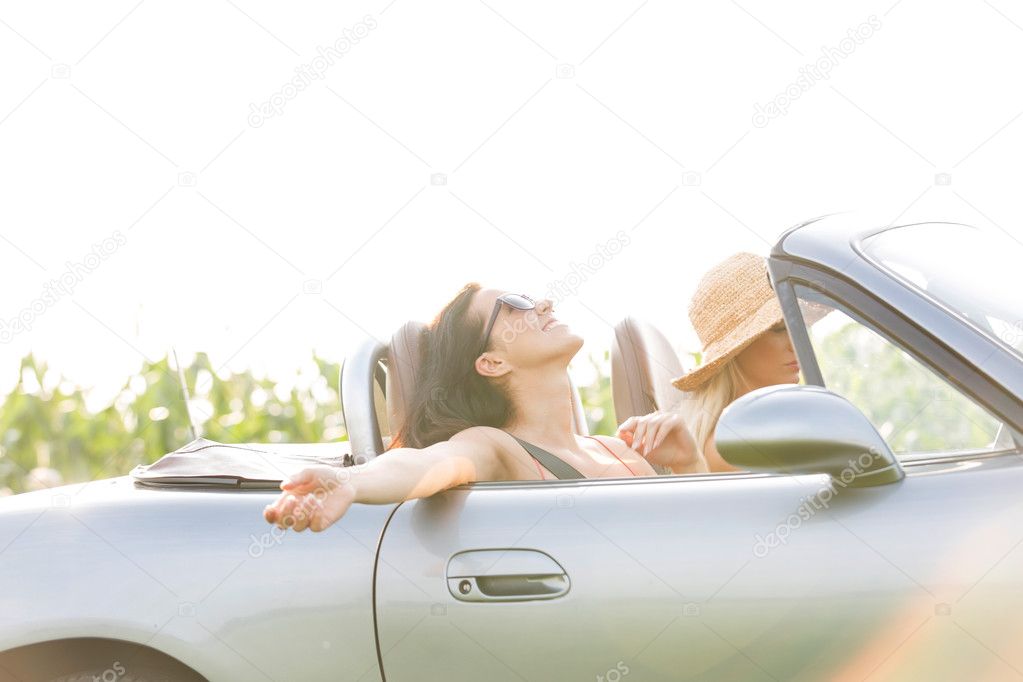 woman enjoying road trip