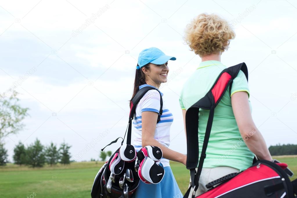 golfer talking to friend