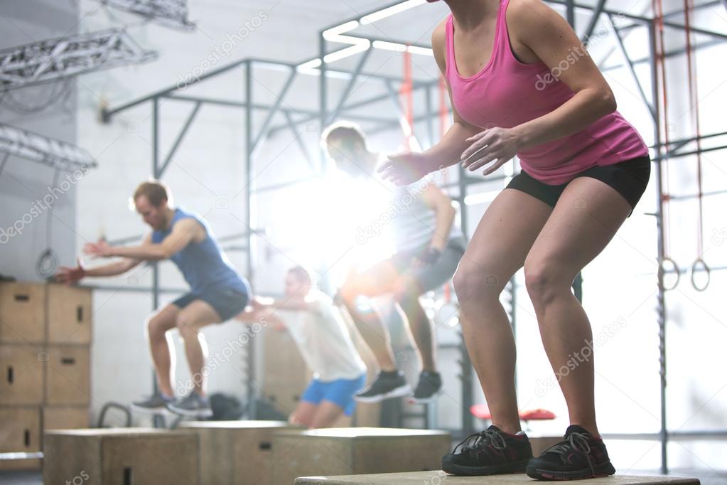 People doing box jump